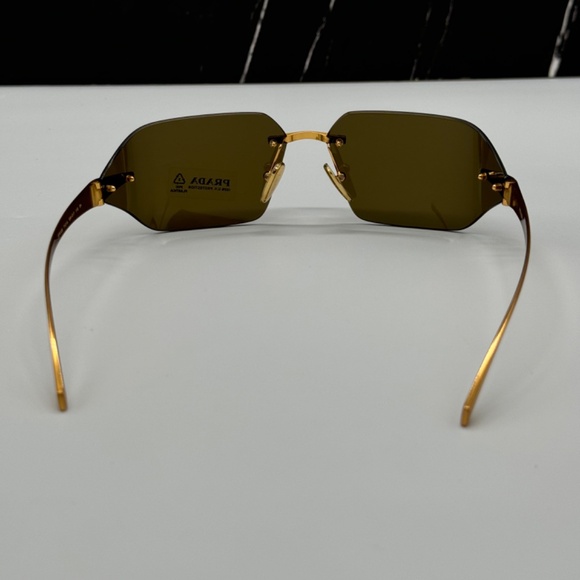 NEW PR A55S 15N01T PRADA GOLD GREEN RIMLESS SPR A55 15N01T WOMEN SUNGLASSES - Picture 6 of 13